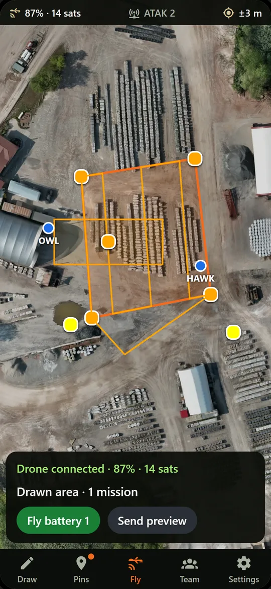 Phone screen: drone connected, 87% battery, 14 satellites, and a green "Fly battery 1" button.